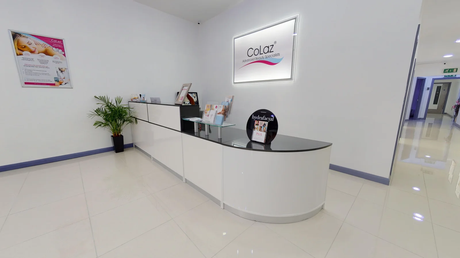 The finished reception at the CoLaz clinic in Derby, with the CoLaz sign behind the desk